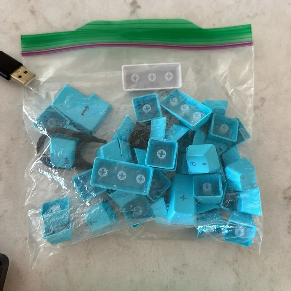 Kraken pro 60 gaming keyboard. Black and light blue keys with cable
